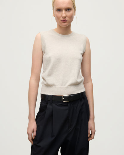 MODEL WEARS JOHNSTONS OF ELGIN WOMENS IRIS CLASSIC SLEEVELESS CREW NATURAL 100% CASHMERE KAP05705HA0402