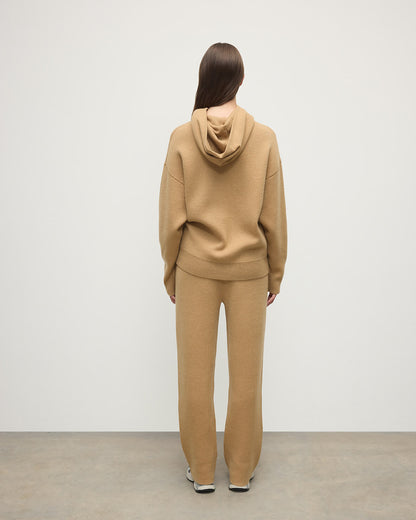 model wearing Johnstons of Elgin AW25 Women's Knitwear Camel & Natural Double-Face Camel Cashmere Joggers Back KBA01036Q25325