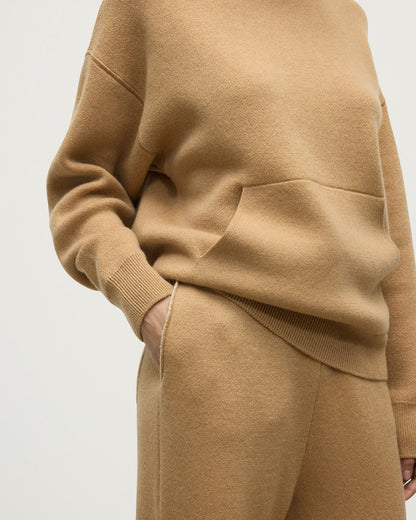 model wearing Johnstons of Elgin AW25 Women's Knitwear Camel & Natural Double-Face Camel Cashmere Joggers details KBA01036Q25325