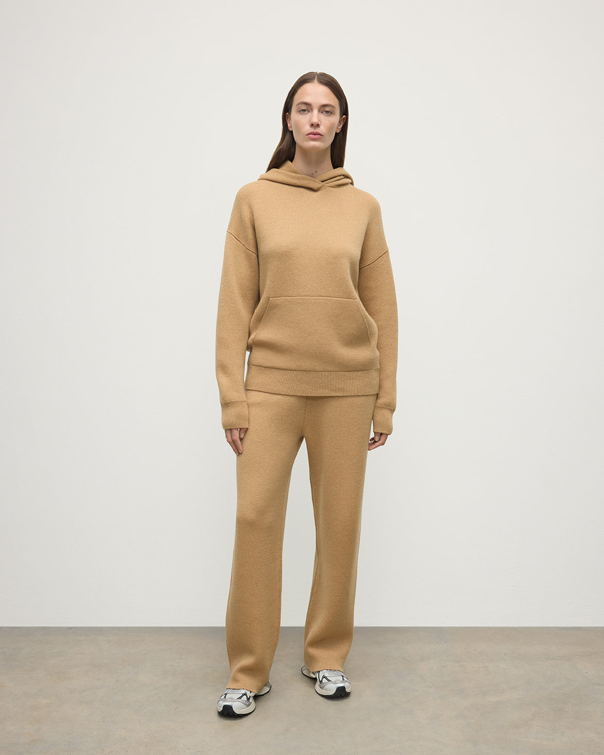 model wearing Johnstons of Elgin AW25 Women's Knitwear Camel & Natural Double-Face Camel Cashmere Joggers Front KBA01036Q25325