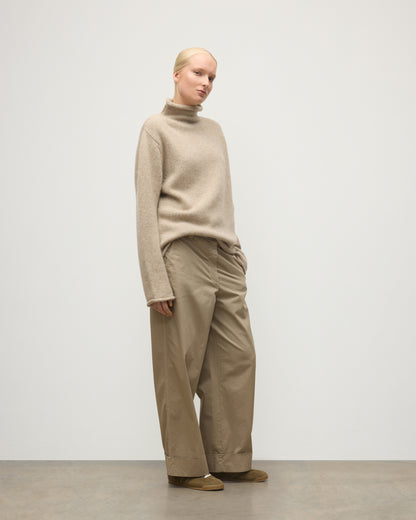 FEMALE MODEL WEARING JOHNSTOS OF ELGIN KESTER FUNNEL NECK SWEATER NATURAL 100% CASHMERE UAC05753006876