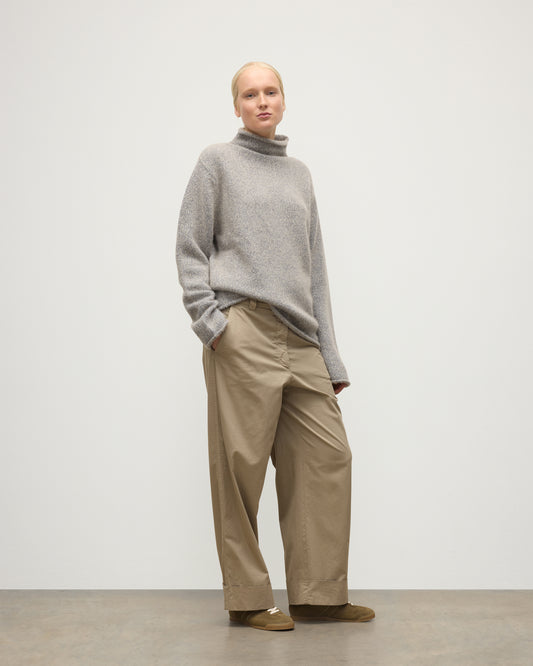 FEMALE MODEL WEARING JOHNSTONS OF ELGIN KESTER FUNNEL NECK SWEATER BLUE 100% CASHMERE UBB01067HD4499