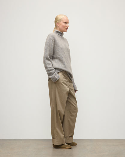 FEMALE MODEL WEARING JOHNSTONS OF ELGIN KESTER FUNNEL NECK SWEATER BLUE 100% CASHMERE UBB01067HD4499
