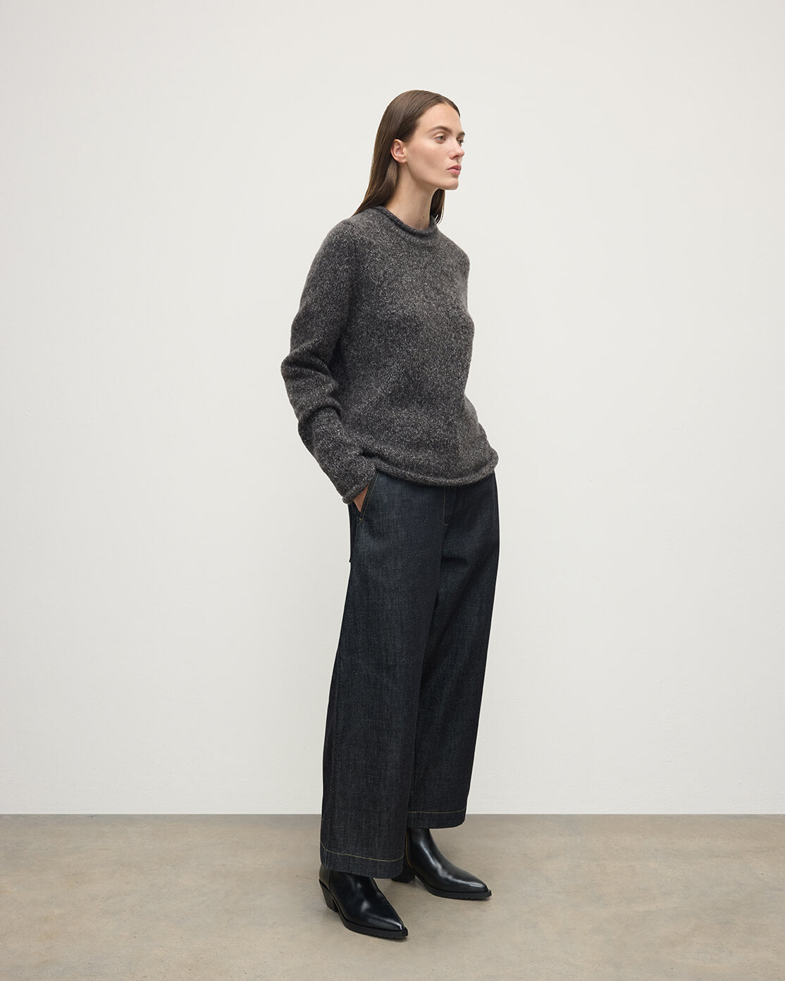 Model wears Johnstons of Elgin AW25 Women's Knitwear Charcoal Brushed Cashmere-Silk Grey Jumper Side View KBC01031HA7198
