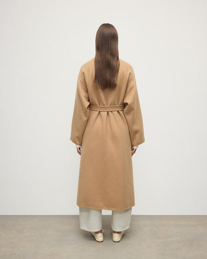 Model wears Johnstons of Elgin Women's Tailoring Camel Camel Cashmere Wrap Coat Front View  TA000621RU7397