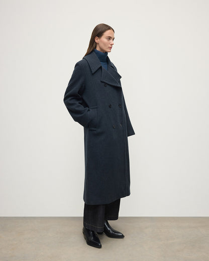 Model wearing Johnstons of Elgin  Women's Tailoring Bottle Dark Twill The Great Coat in Green Front View TD000438RU7672