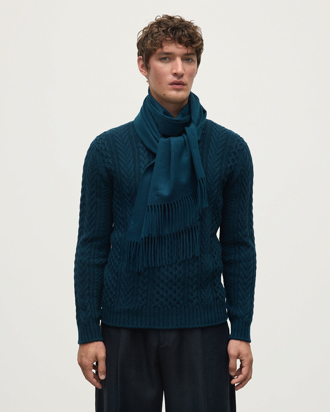 Model wears Johnstons of Elgin  Woven Accessories Bottle Green Bottle Wide Cashmere Scarf WA000057SC7319ONE