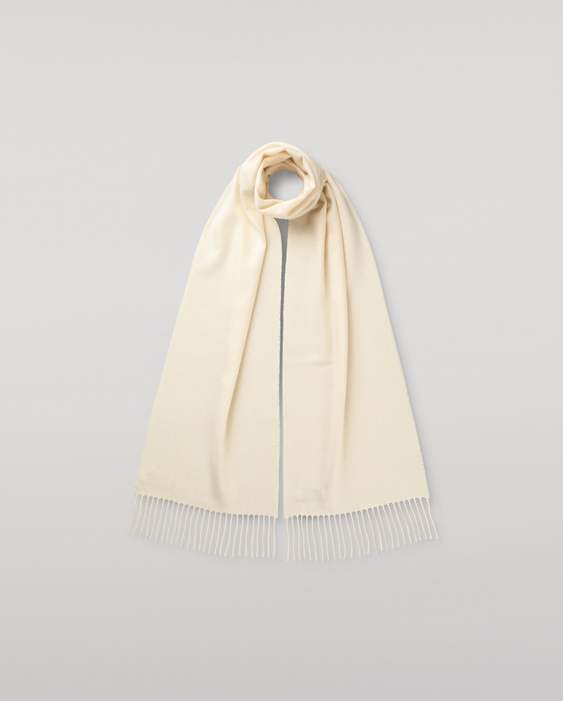 Johnstons of Elgin Cashmere Scarf in White on a white background WA0000160001ONE