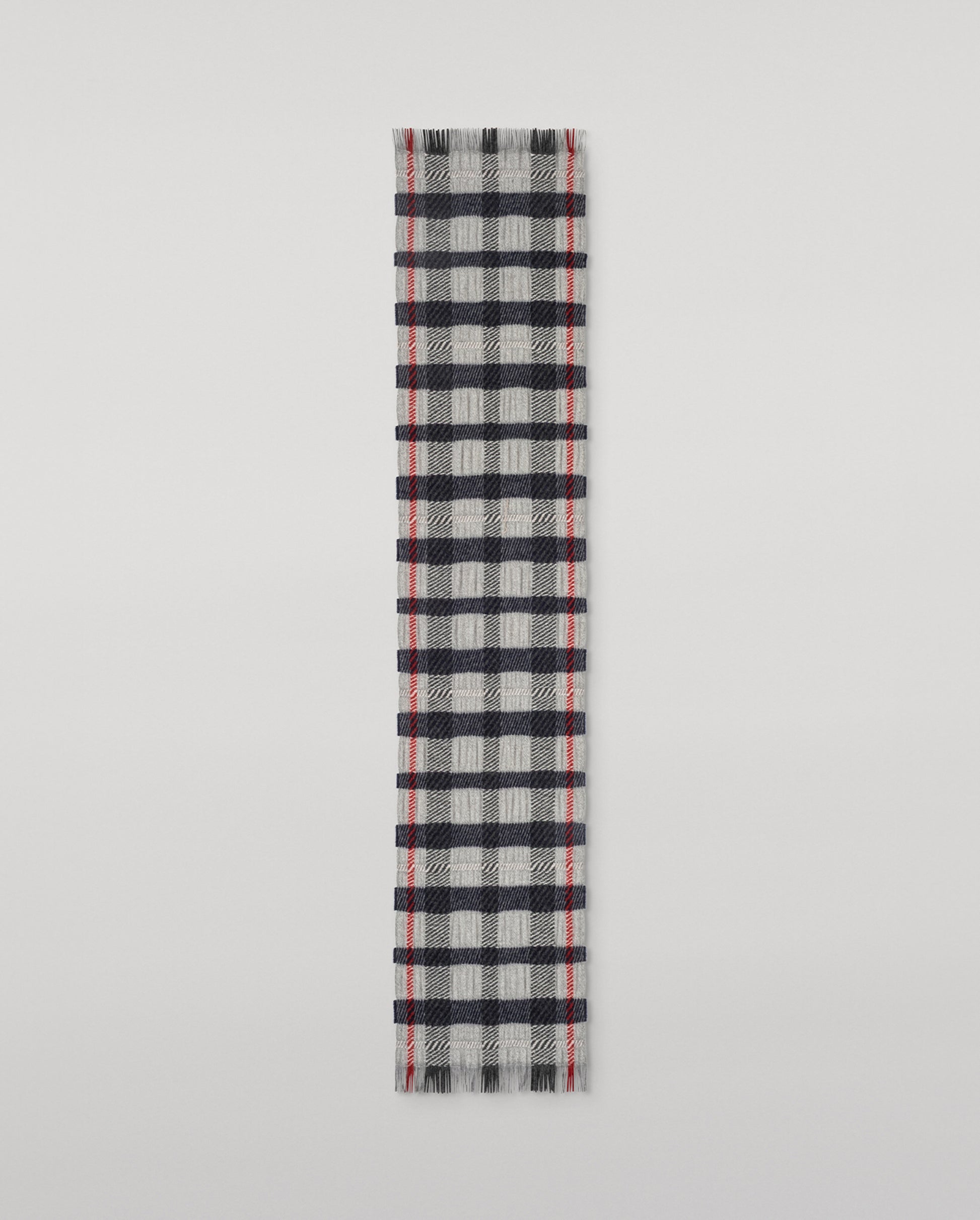Johnstons of Elgin Plaid scarf with black, red, and gray pattern on a light gray background WA002615RU7820