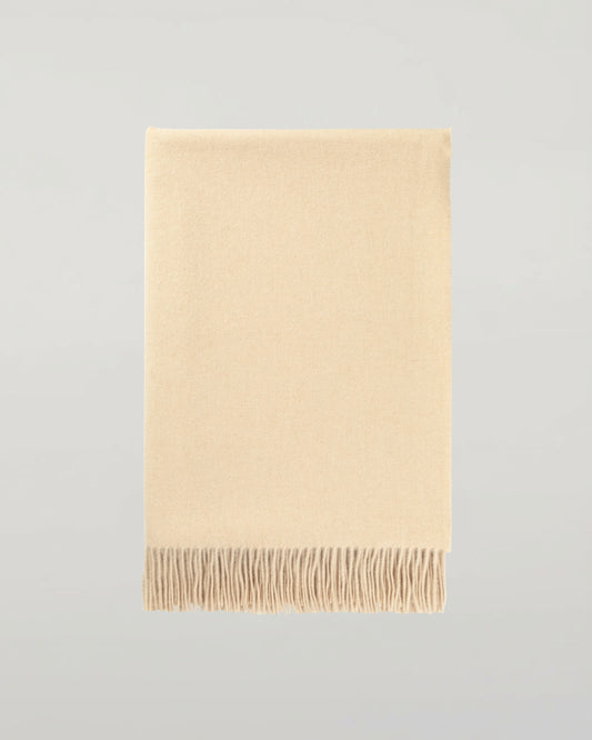Johnstons of Elgin Interiors Collection Blonde Blonde Cashmere Throw on a grey background  WA000055HB0167ONE