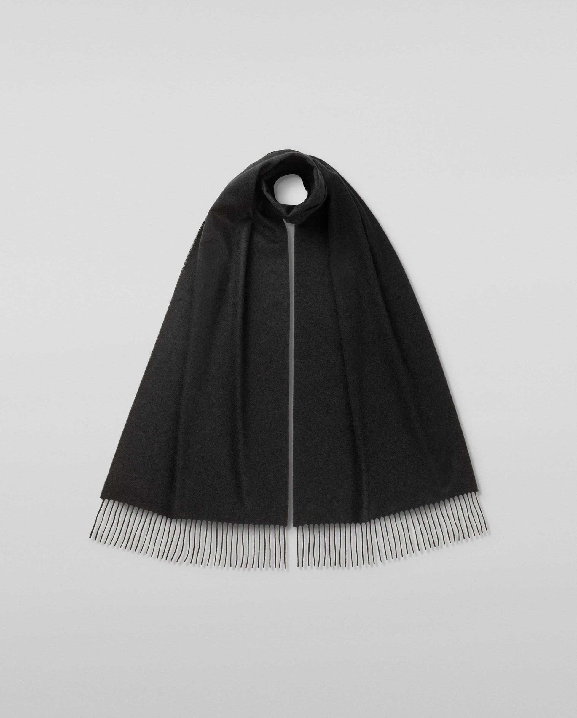 Johnstons of Elgin Ultrafine Merino Wool Scarf in Black on a white background WDC01797SA0900N/A